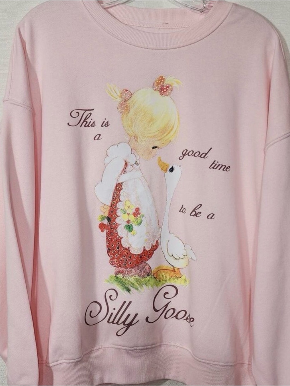 Precious moment "Silly goose"
Pink sweatshirt size small